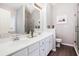 A spacious bathroom with double sinks, lots of counter space, and a large mirror at 173 Mill Creek Dr, Canton, GA 30115