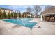 Community pool for residents including pool furniture at 173 Mill Creek Dr, Canton, GA 30115