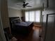 Serene bedroom with hardwood floors and a ceiling fan at 650 Kingston Highway, Kingston, GA 30145
