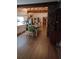 Open kitchen with a farmhouse table and exposed wooden beams at 650 Kingston Highway, Kingston, GA 30145