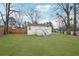 This spacious backyard features new lawn, patio and lush trees, perfect for Gathering gatherings and outdoor enjoyment at 1288 Almont Sw Dr, Atlanta, GA 30310