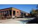 The building's exterior features brick, stylish signage, and an inviting entrance, perfect for a business or entertainment venue at 1288 Almont Sw Dr, Atlanta, GA 30310