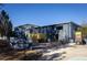 Exterior view of a building featuring a brewery with outdoor seating, landscaping, and distinctive signage, creating an inviting ambiance at 1288 Almont Sw Dr, Atlanta, GA 30310