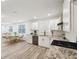 Modern kitchen featuring stainless steel appliances, granite countertops, subway tile backsplash, and white cabinets at 1288 Almont Sw Dr, Atlanta, GA 30310