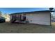 Rear view of house showing deck and AC unit at 206 Sherwood Loop, Mcdonough, GA 30253