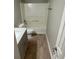 Bathroom with tub/shower combo and grey vanity at 206 Sherwood Loop, Mcdonough, GA 30253