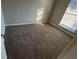 Bright bedroom with large window and neutral decor at 206 Sherwood Loop, Mcdonough, GA 30253