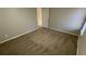 Well-lit bedroom featuring neutral walls and carpeting at 206 Sherwood Loop, Mcdonough, GA 30253