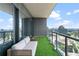 Spacious balcony with artificial turf and city views at 3630 Peachtree Ne Rd # 2005, Atlanta, GA 30326