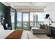 Main bedroom with city view and sitting area at 3630 Peachtree Ne Rd # 2005, Atlanta, GA 30326