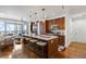 Modern kitchen with island, stainless steel appliances, and hardwood floors at 3630 Peachtree Ne Rd # 2005, Atlanta, GA 30326
