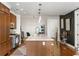 Modern kitchen with island, custom cabinetry, and hardwood floors at 3630 Peachtree Ne Rd # 2005, Atlanta, GA 30326
