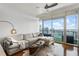 Living room with sectional sofa and stunning city views at 3630 Peachtree Ne Rd # 2005, Atlanta, GA 30326