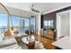 Living area with sectional sofa, hardwood floors, and city views at 3630 Peachtree Ne Rd # 2005, Atlanta, GA 30326
