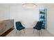 Charming office features two armchairs and a unique bookcase at 3630 Peachtree Ne Rd # 2005, Atlanta, GA 30326