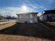 Tan house with large backyard, needs some landscaping at 2043 Chicago Nw Ave, Atlanta, GA 30314
