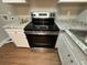 Stainless steel range and granite countertops at 2043 Chicago Nw Ave, Atlanta, GA 30314