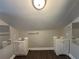 Bathroom with double vanity and updated flooring at 2669 Blount St, Atlanta, GA 30344