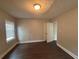Simple bedroom with dark hardwood floors and neutral walls at 2669 Blount St, Atlanta, GA 30344
