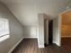 Small attic bedroom with wood floors and a closet at 2669 Blount St, Atlanta, GA 30344