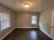 Well-lit bedroom featuring hardwood flooring and ample space at 2669 Blount St, Atlanta, GA 30344