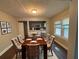 Elegant dining room featuring a wood table and six chairs at 2669 Blount St, Atlanta, GA 30344