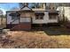 Ranch style home with front yard and steps leading to the entrance at 2669 Blount St, Atlanta, GA 30344