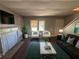 Living room featuring dark hardwood floors, fireplace and comfy seating at 2669 Blount St, Atlanta, GA 30344