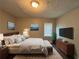 Main bedroom with a king-size bed and mid-century modern furniture at 2669 Blount St, Atlanta, GA 30344