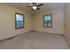 Spacious bedroom with carpet, natural light from two windows, and plenty of open space at 336 Shady Lane Cir, Canton, GA 30115