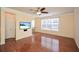 Hardwood floor living room with built-in media niche at 3649 Chattahoochee Summit Se Dr # 15, Atlanta, GA 30339