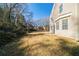 Landscaped backyard with spacious grassy area at 1129 Winston Dr, Decatur, GA 30032