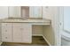 Bathroom with granite countertop and white cabinets at 1129 Winston Dr, Decatur, GA 30032