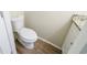 Small bathroom with toilet and granite countertop at 1129 Winston Dr, Decatur, GA 30032