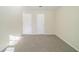Bedroom with two closets and neutral carpet at 1129 Winston Dr, Decatur, GA 30032