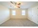 Spacious bedroom with ceiling fan and neutral decor at 1129 Winston Dr, Decatur, GA 30032