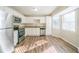Modern kitchen with stainless steel appliances and granite countertops at 1129 Winston Dr, Decatur, GA 30032