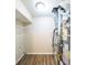 Laundry room with overhead shelving and HVAC unit at 1129 Winston Dr, Decatur, GA 30032