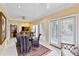Cozy dining area with French doors, an ornate rug, and views to the outside at 837 Pine Ridge Dr, Lawrenceville, GA 30043