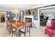 Elegant dining room includes a chandelier, floral wallpaper, and views of multiple rooms at 837 Pine Ridge Dr, Lawrenceville, GA 30043
