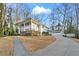 Inviting two-story home features a driveway, attached garage, and well-maintained landscaping at 837 Pine Ridge Dr, Lawrenceville, GA 30043