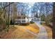 Inviting two-story home features a driveway, attached garage, and well-maintained landscaping at 837 Pine Ridge Dr, Lawrenceville, GA 30043
