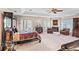 Spacious main bedroom features fireplace, french doors, high ceilings, and nice furniture at 837 Pine Ridge Dr, Lawrenceville, GA 30043