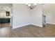 Formal dining room with hardwood floors and chandelier at 404 Discovery Ln, Ellenwood, GA 30294