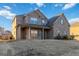 Two story house with light brick and blue shutters at 404 Discovery Ln, Ellenwood, GA 30294