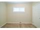 Cozy bedroom with neutral walls and wood paneling at 1583 Tanager Cir, Decatur, GA 30032