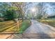 Ranch house with driveway, landscaping, and mailbox at 1583 Tanager Cir, Decatur, GA 30032