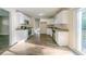 Modern kitchen with white cabinets, granite counters, and stainless steel appliances at 1583 Tanager Cir, Decatur, GA 30032