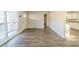 Open living area with hardwood floors and access to kitchen at 1583 Tanager Cir, Decatur, GA 30032