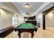 Basement features pool table, wet bar, and additional game space at 340 Kincardine Way, Alpharetta, GA 30022